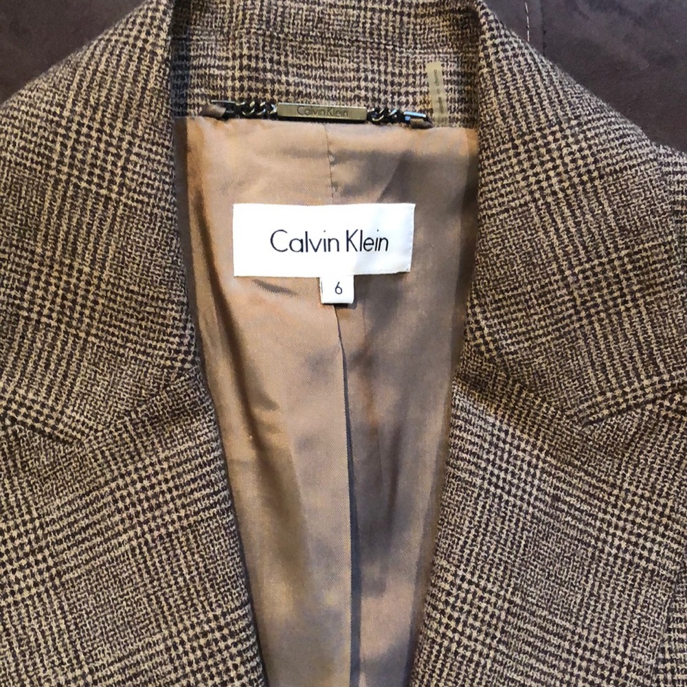 Calvin Klein woman brown/tan pant suit.